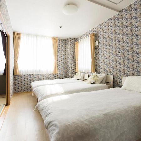 Guest House Sora Ōsaka Exterior foto