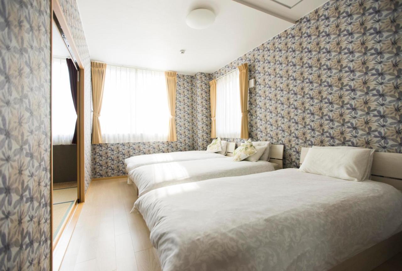Guest House Sora Ōsaka Exterior foto