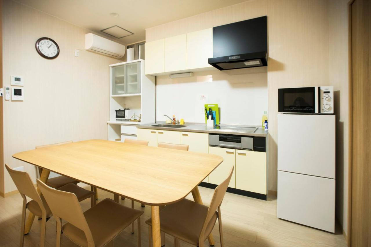 Guest House Sora Ōsaka Exterior foto