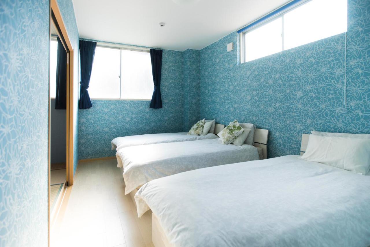 Guest House Sora Ōsaka Exterior foto