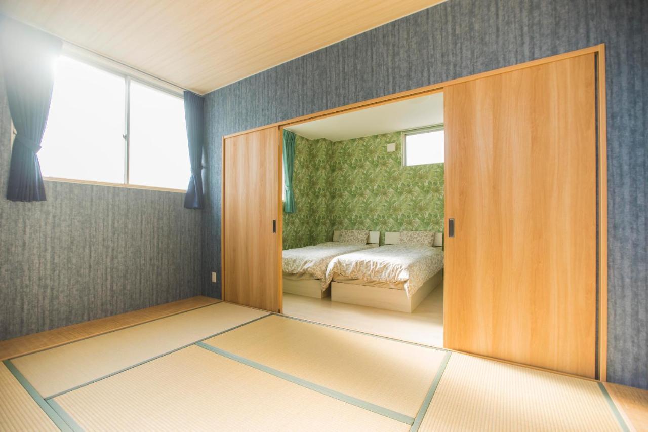 Guest House Sora Ōsaka Exterior foto