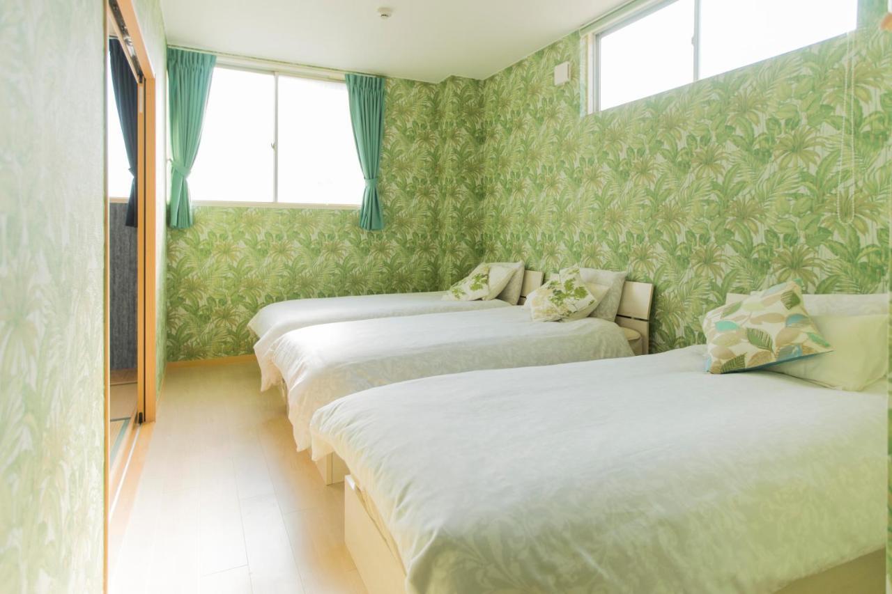 Guest House Sora Ōsaka Exterior foto