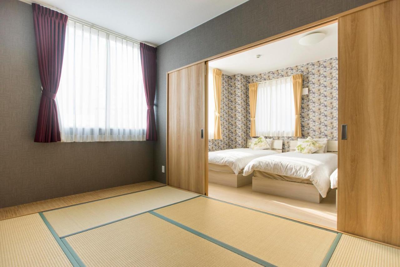 Guest House Sora Ōsaka Exterior foto