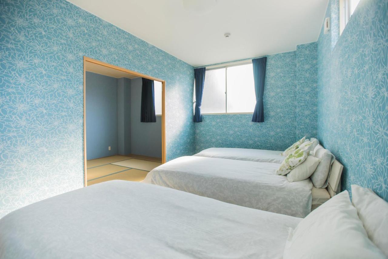 Guest House Sora Ōsaka Exterior foto