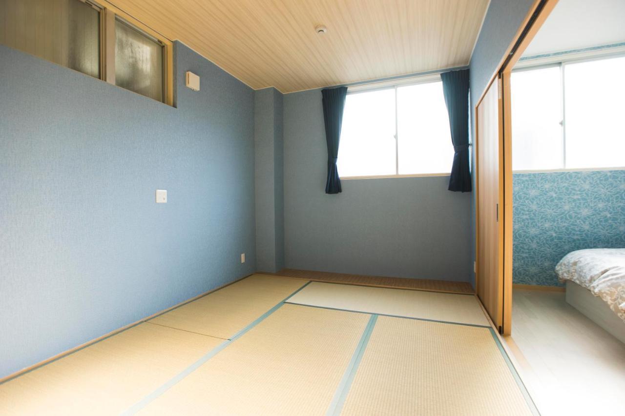 Guest House Sora Ōsaka Exterior foto